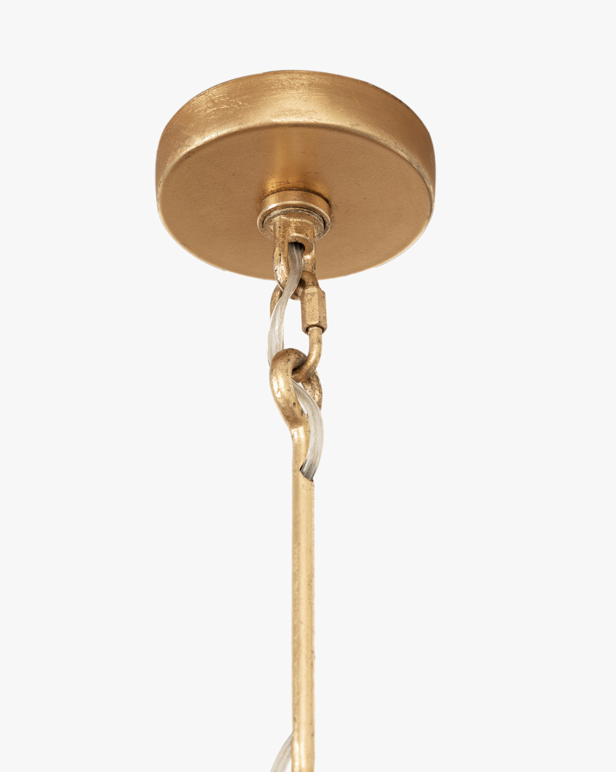 Close-up of the Scarlett Pendant’s gold leafed iron ceiling mount with a round canopy, metal chain, and rod—ideal for elegant lighting—shown suspended against a plain white background, by McGee & Co.