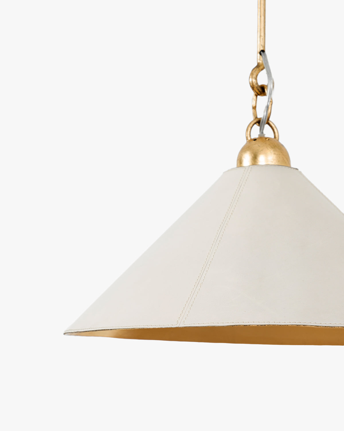 A close-up of the Scarlett Pendant, showcasing its wide conical white shade with elegant gold leafed iron accents on the top and interior, set against a plain white background, by McGee & Co.