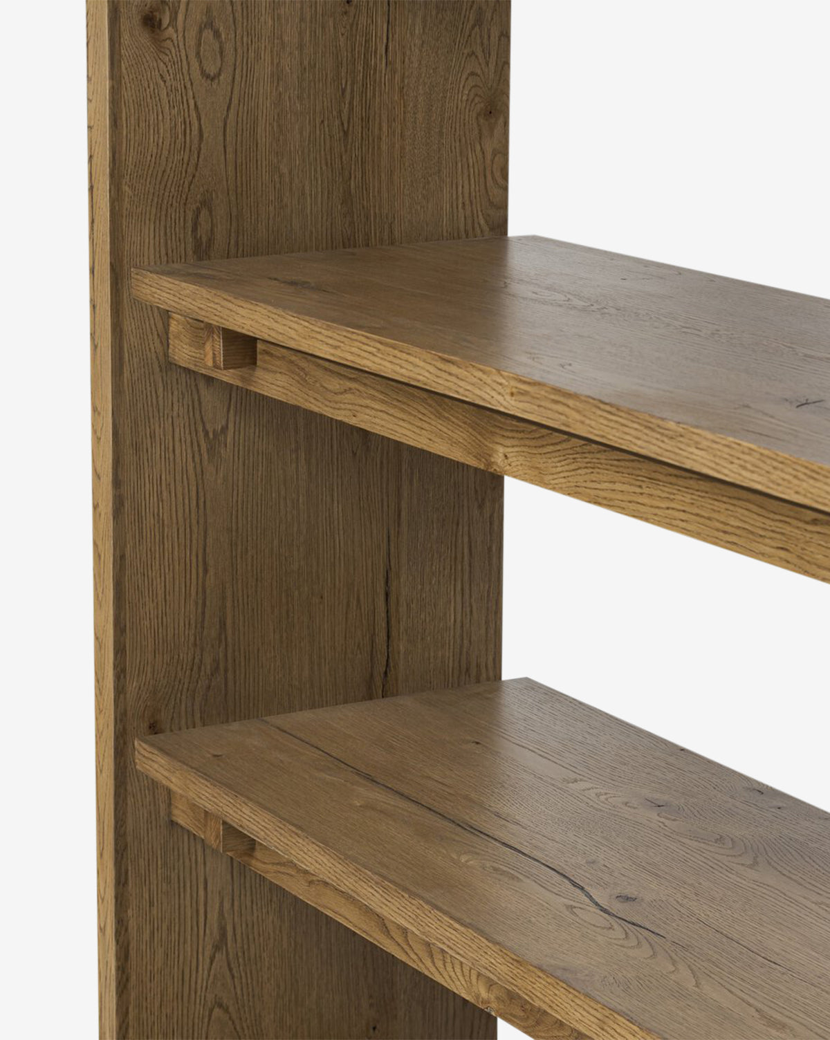Close-up of the Selene Bookcase featuring two shelves and a side panel, emphasizing the natural wood grain and organic design, by McGee & Co.