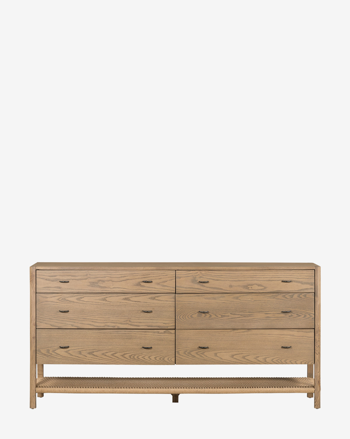 The Sequoia Dresser features six drawers with sleek metal handles and a lower open shelf with a decorative edge, made from light wood in Danish design, shown against a plain white background by McGee & Co.