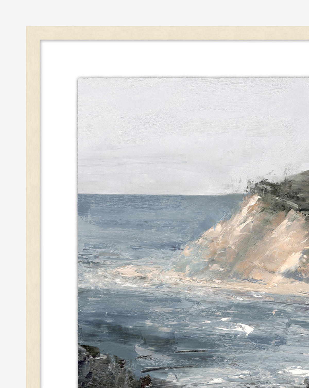 Shoreside is a serene wall art featuring a rocky coastline and crashing waves beneath a pale sky, rendered in soft tones and framed with light wood—ideal for cool-colored decor.