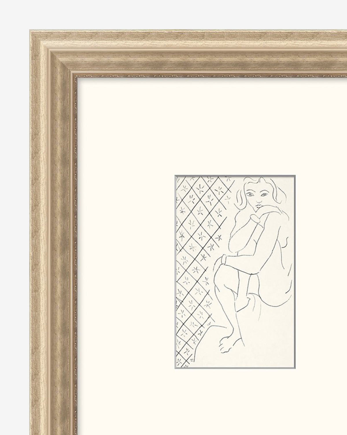 Simple Sketched Woman features a line drawing of a seated woman with her chin on her hand, set against a patterned background. This elegant wall art comes in a light wooden traditional frame with a wide white mat.