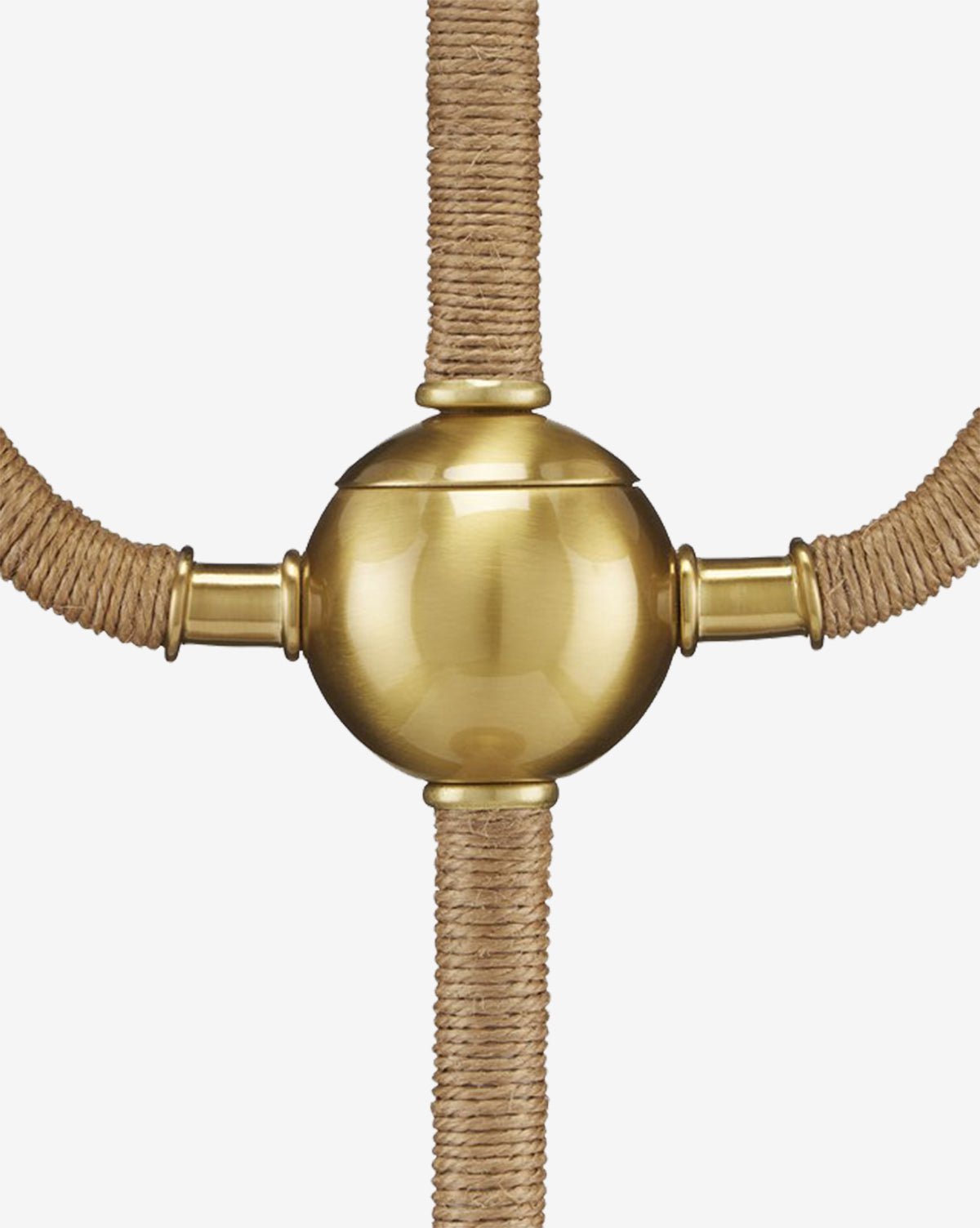 The Sirocco Desk Lamp is a shiny gold-metal sphere with four cylindrical connectors, attached to thick tan ropes wrapped in twine and arranged in a cross pattern, displayed on a white background by McGee & Co.