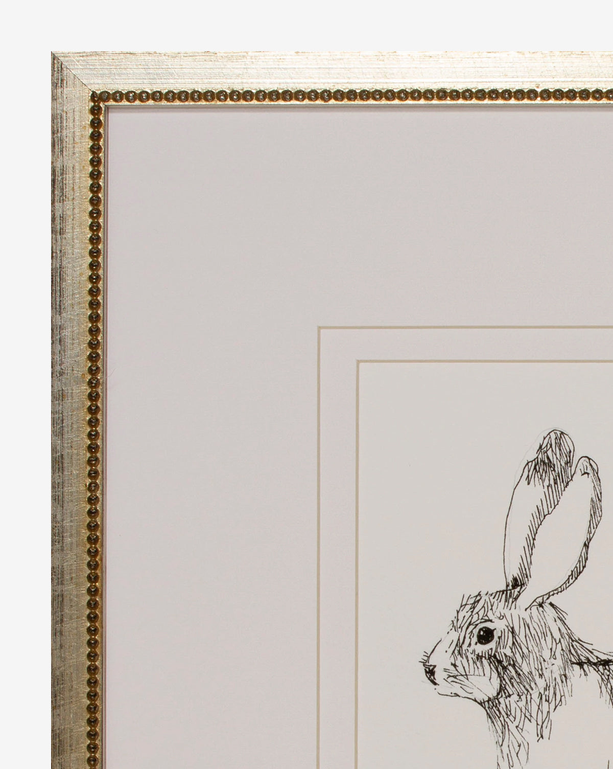 A close-up of Sketched Bunny I displays a minimalist rabbit’s head and upper body on the right side of a white mat in a gold-edged frame—an ideal whimsical wall art piece for childrens room decor.