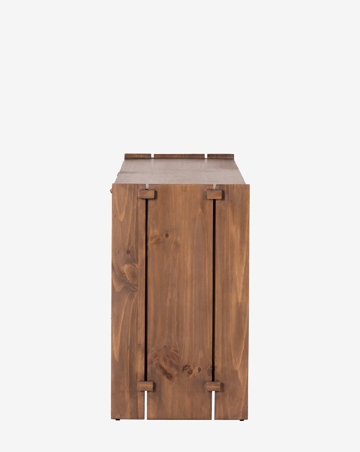 Side view of the Sloane Sideboard, a rectangular wooden storage box with visible wood grain, dovetail joints, leather pulls, and a smooth polished finish. The design evokes European midcentury style against a plain white background, by McGee & Co.