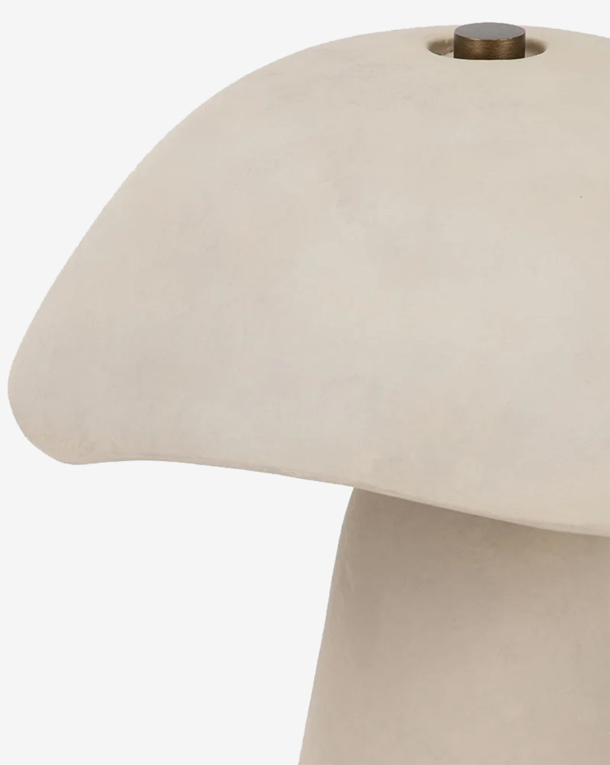 Close-up of the Soloma Table Lamp, a mushroom-shaped piece crafted in artisan white ceramic with a smooth, rounded top and a small metallic knob—ideal for lovers of contemporary design, by McGee & Co.