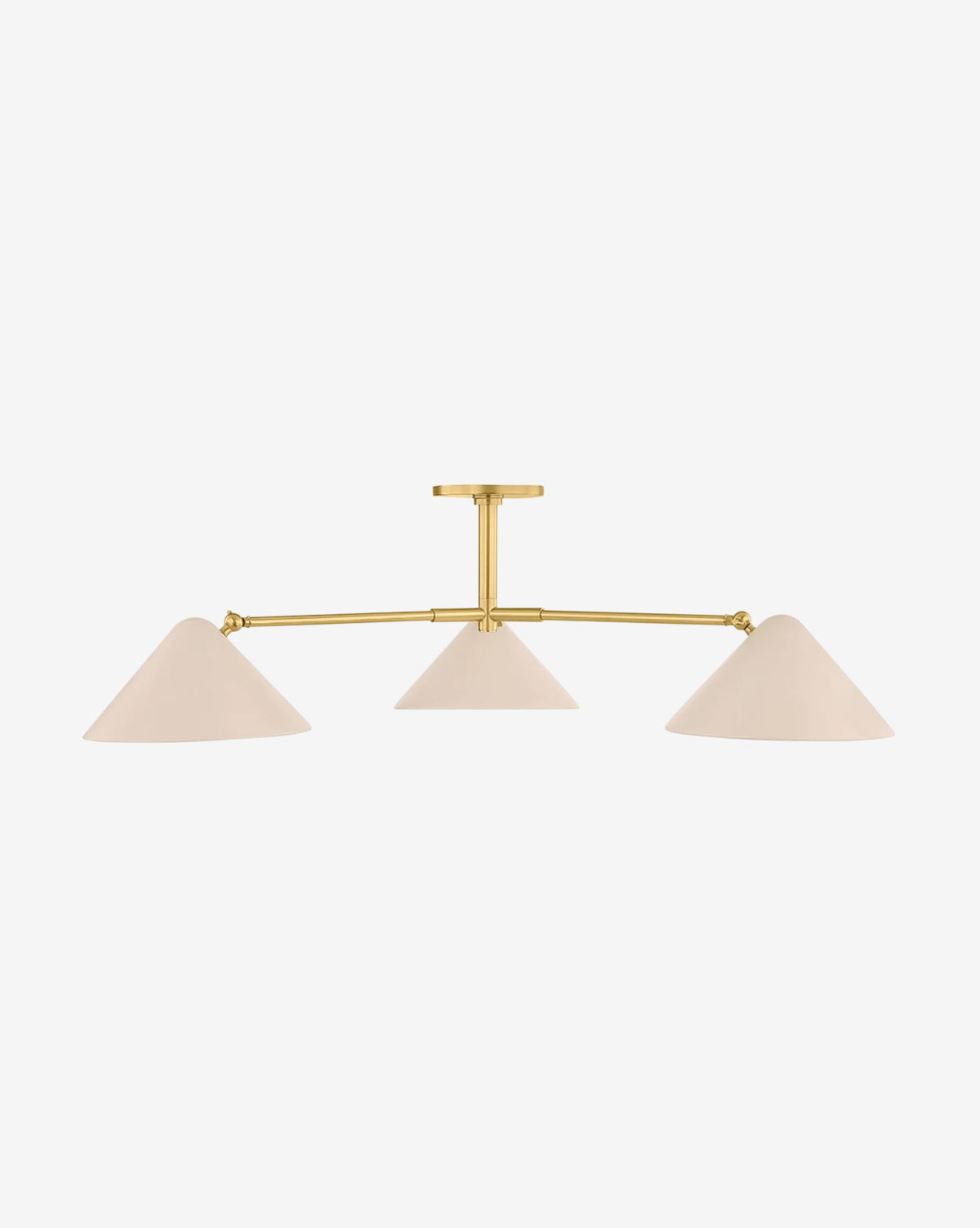 The Sonja Chandelier by Hudson Valley Lighting features an aged brass frame with three white conical shades in a row, offering minimalist, mid-century modern style to any space. McGee & Co.