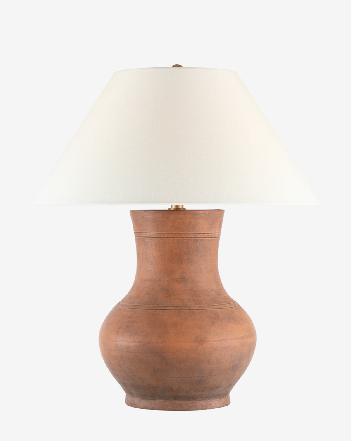 The Sorrento Table Lamp showcases a wide, rounded terracotta base paired with a large white linen shade, offering an elegant accent to any space, by McGee & Co.