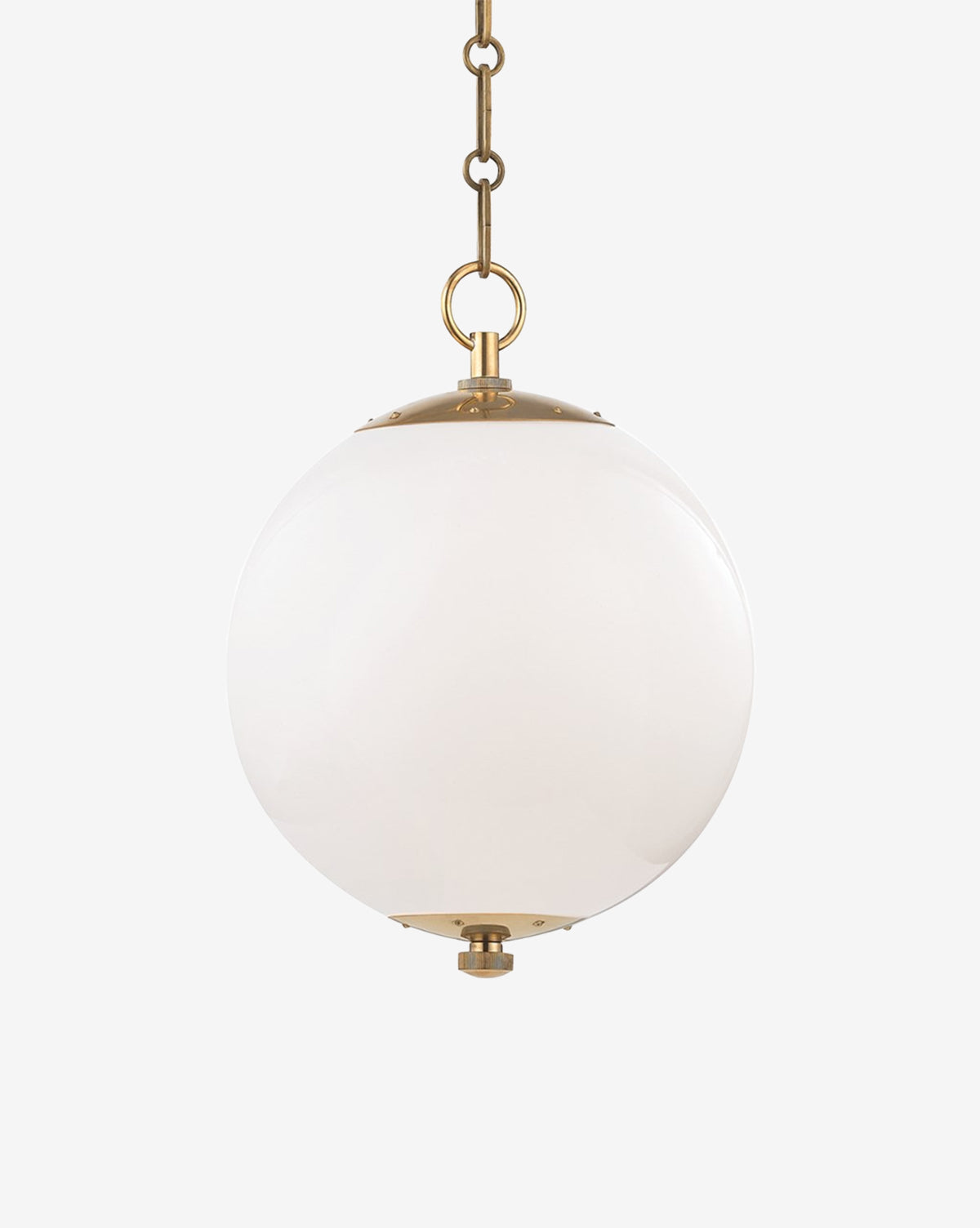 The Sphere No. 1 Pendant features a round white glass shade with brass caps and hangs from a brass chain—an elegant choice for illuminating your kitchen island against a crisp white background, by McGee & Co.