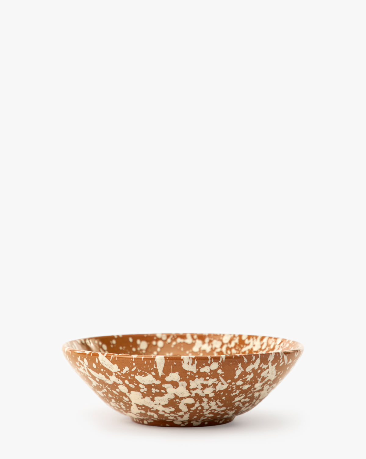 The Splatter Large Bowl, featuring a brown base and white speckled design, highlights artisan ceramic craftsmanship against a plain white background, by McGee & Co.