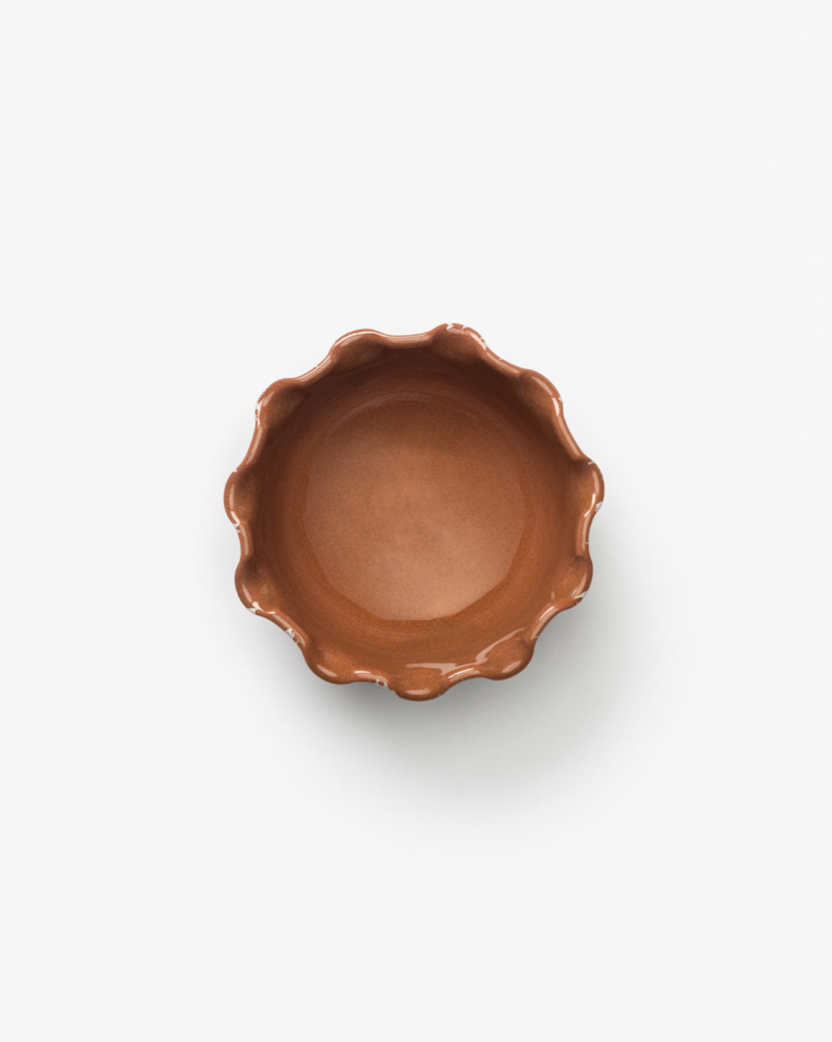 The Splatter Scallop Dish is a round, artisan ceramic bowl with a glossy finish and wavy scalloped rim, shown from above on a plain white background, by McGee & Co.