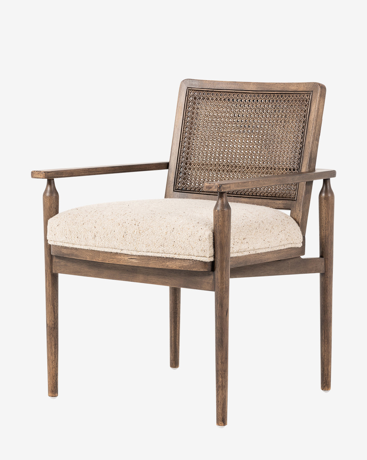 The Zalan Dining Armchair features a natural wood finish, cane back, beige upholstered seat, armrests, and a simple modern design with clean lines, by McGee & Co.