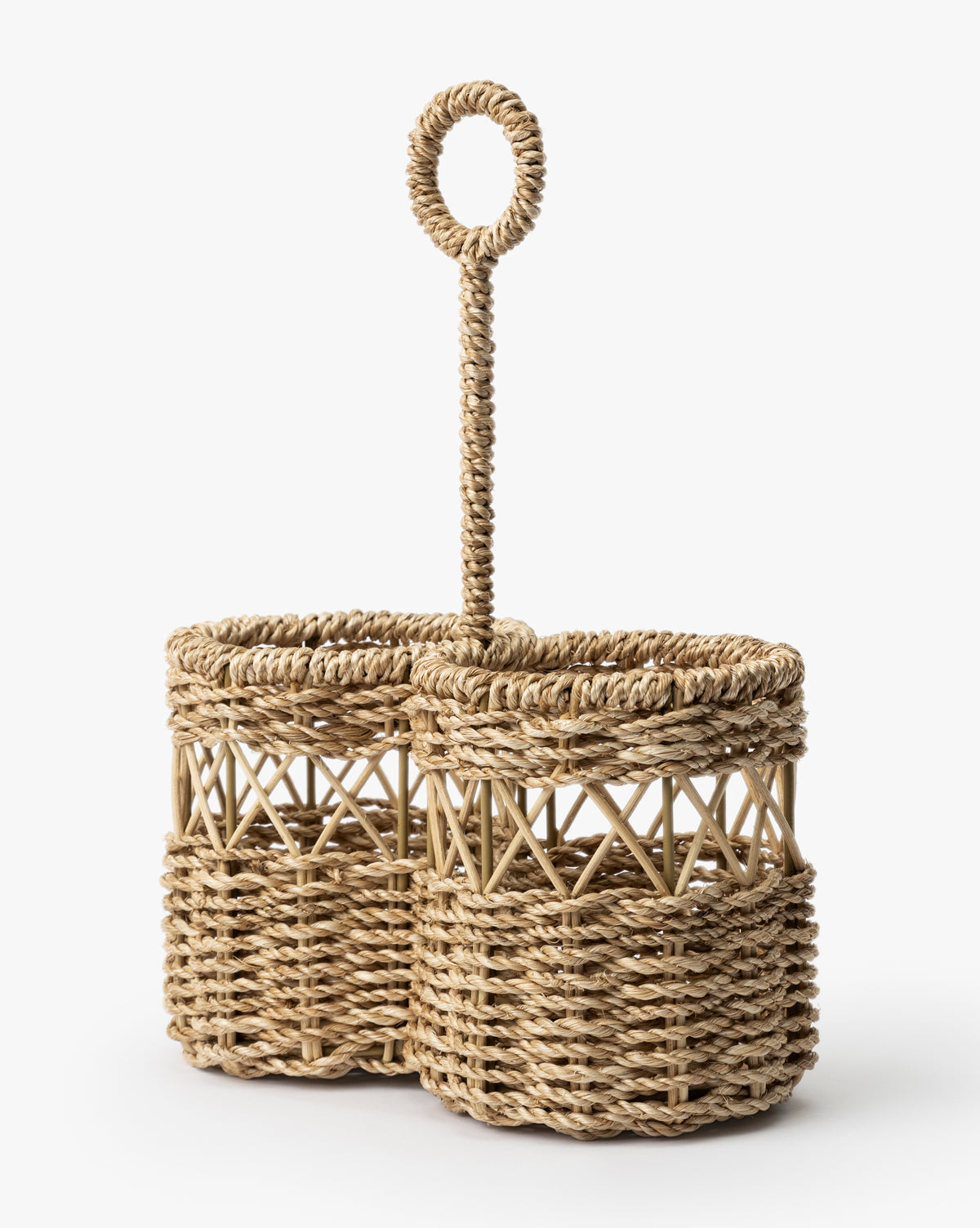 The Stokes Woven Caddy features two round abaca wicker compartments and a tall central handle with a circular loop, ideal for organizing your kitchen counter, by McGee & Co.