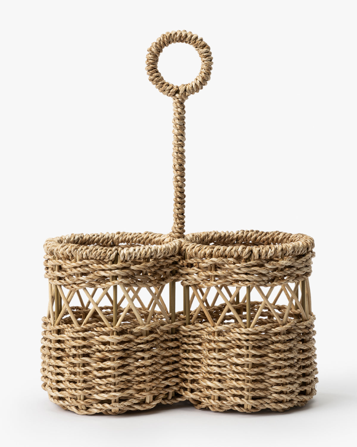 The Stokes Woven Caddy features two round compartments and a tall, looped handle, all crafted from natural abaca wicker—perfect for adding stylish organization to your kitchen counter, by McGee & Co.