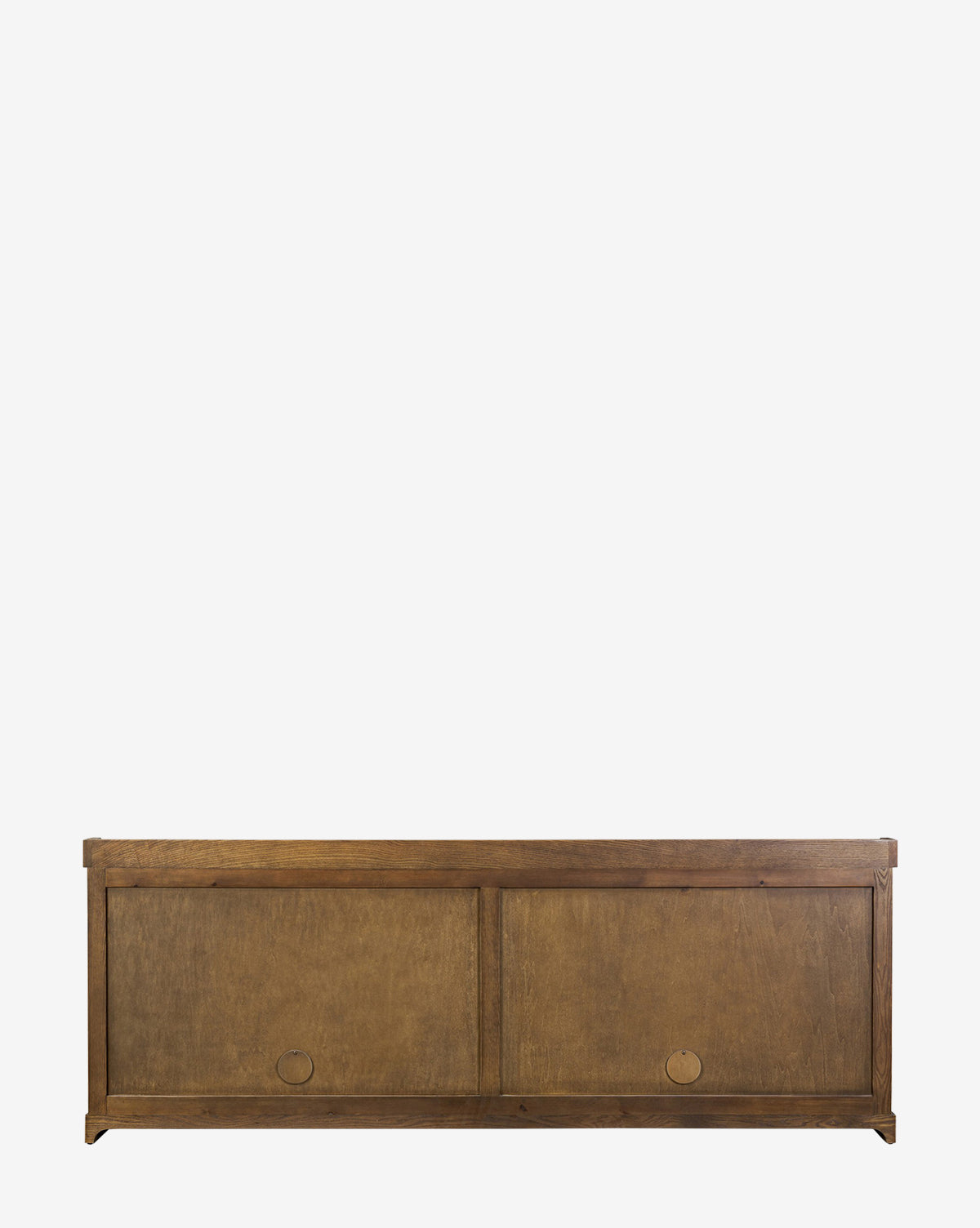 The Stonington Oak Sideboard is a vintage-inspired wooden storage bench in weathered washed oak, featuring a rectangular shape, two sliding doors with circular cut-out handles, shown on a plain white background by McGee & Co.