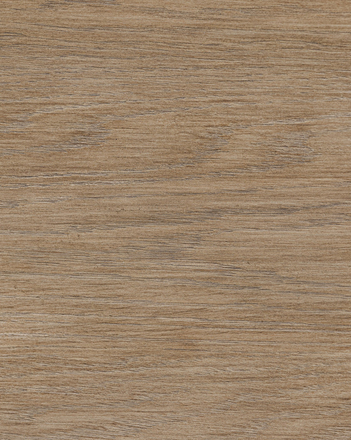 A close-up of the Stonington Oak Sideboard reveals its weathered washed oak surface, light brown hue, and natural grain pattern, showcasing the subtle color variations and vintage-inspired charm of this elegant piece, by McGee & Co.