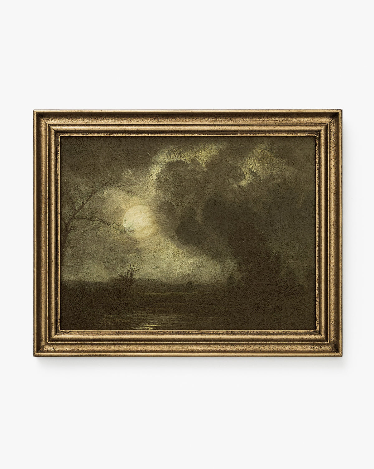 Storm on the Lake is a framed painting featuring a spooky landscape with a cloudy night sky, full moon, barren trees, and a quiet lake—an evocative piece of home decor.