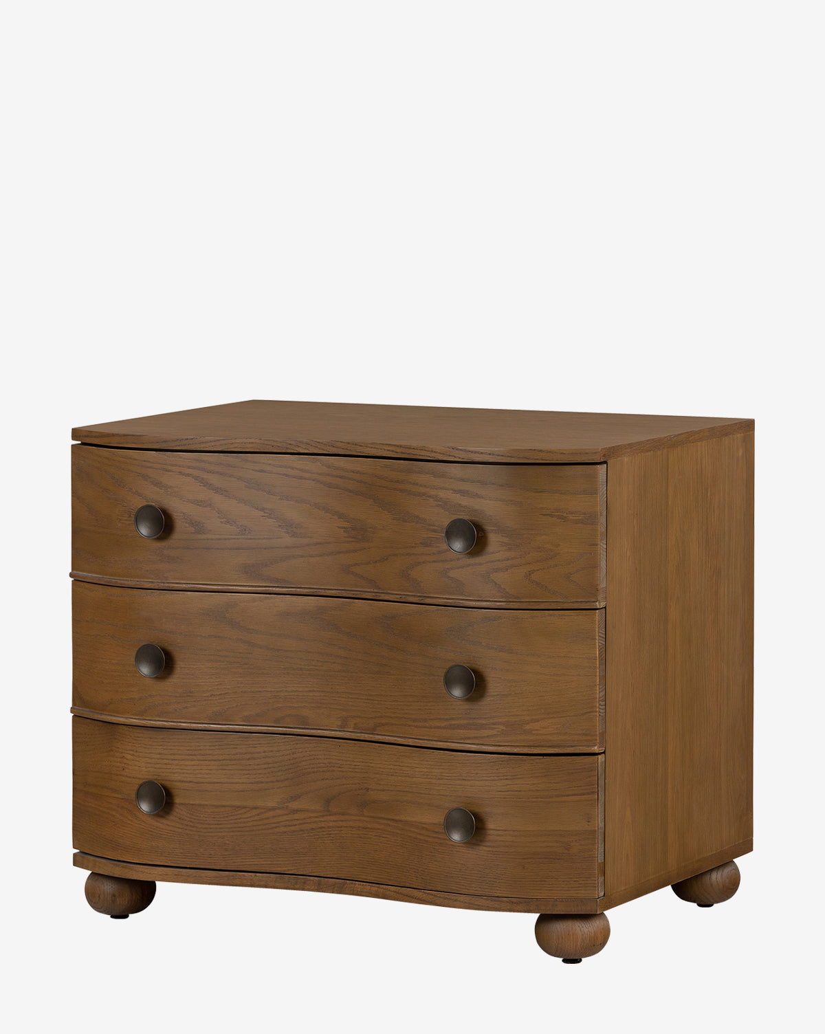 The Strasburg Nightstand features three curved drawers, dark round knobs, and small feet—an ideal wooden dresser for antique nightstand lovers, perfect for enhancing bedroom style against a white background, by McGee & Co.