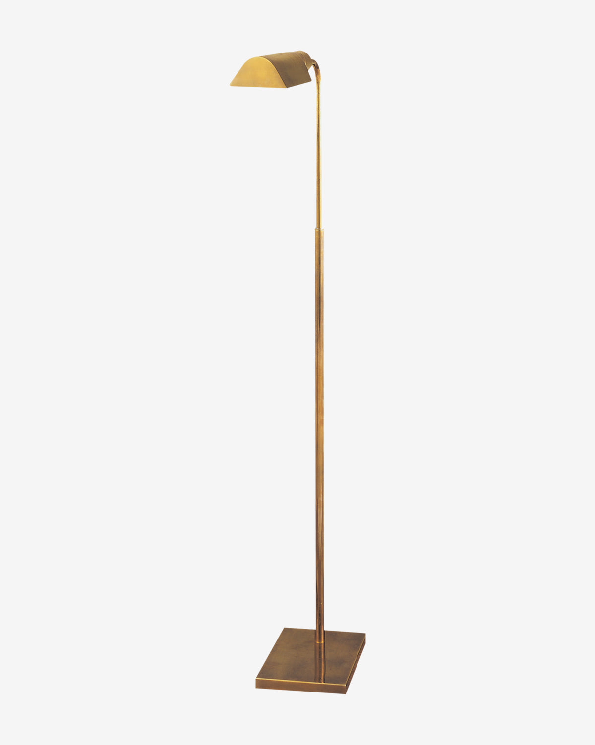 The Studio Adjustable Floor Lamp features a slim brass stand, square base, and angled rectangular shade—all in a matching metallic finish. Its minimalist, modern design is perfect for reading, by McGee & Co.