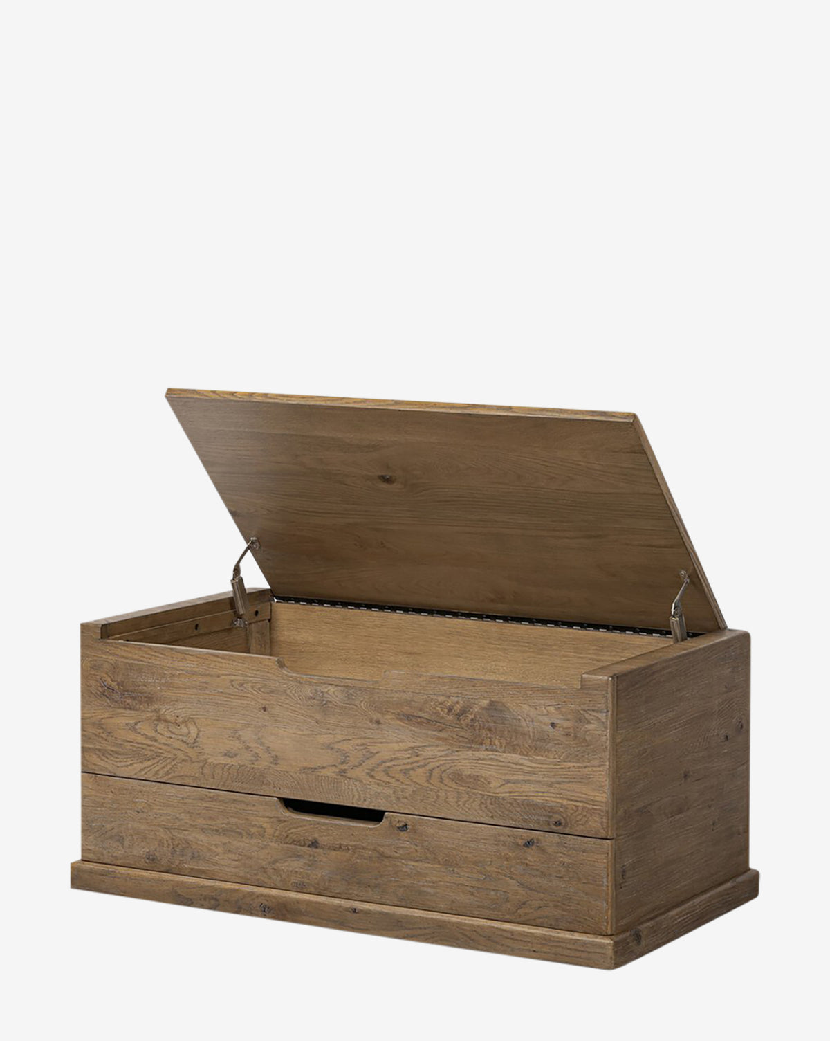The Sutton Trunk is a weathered oak storage chest with a rustic finish, hinged lid, front handle, and flat base. Its partially open lid reveals the inner compartment against a plain white background, by McGee & Co.