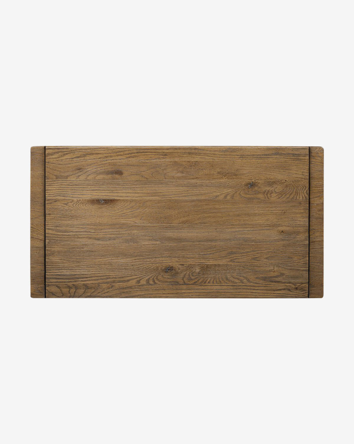 The Sutton Trunk features a rectangular wooden tabletop with a natural weathered oak grain finish, shown from above against a plain white background by McGee & Co.