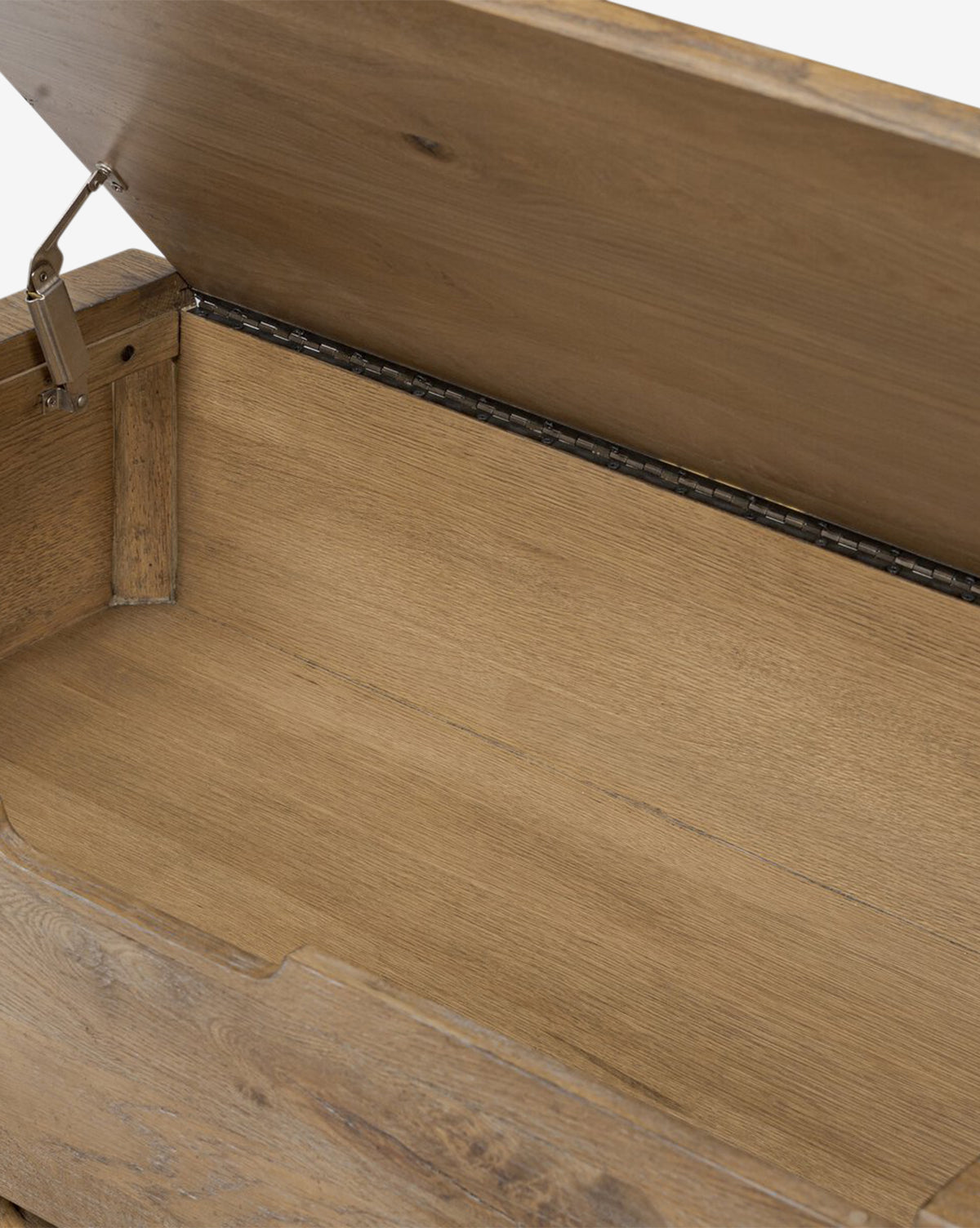 Open the Sutton Trunk wooden storage chest to reveal its spacious, empty interior and admire the natural weathered oak grain finish, highlighted by a sturdy hinged lid, by McGee & Co.