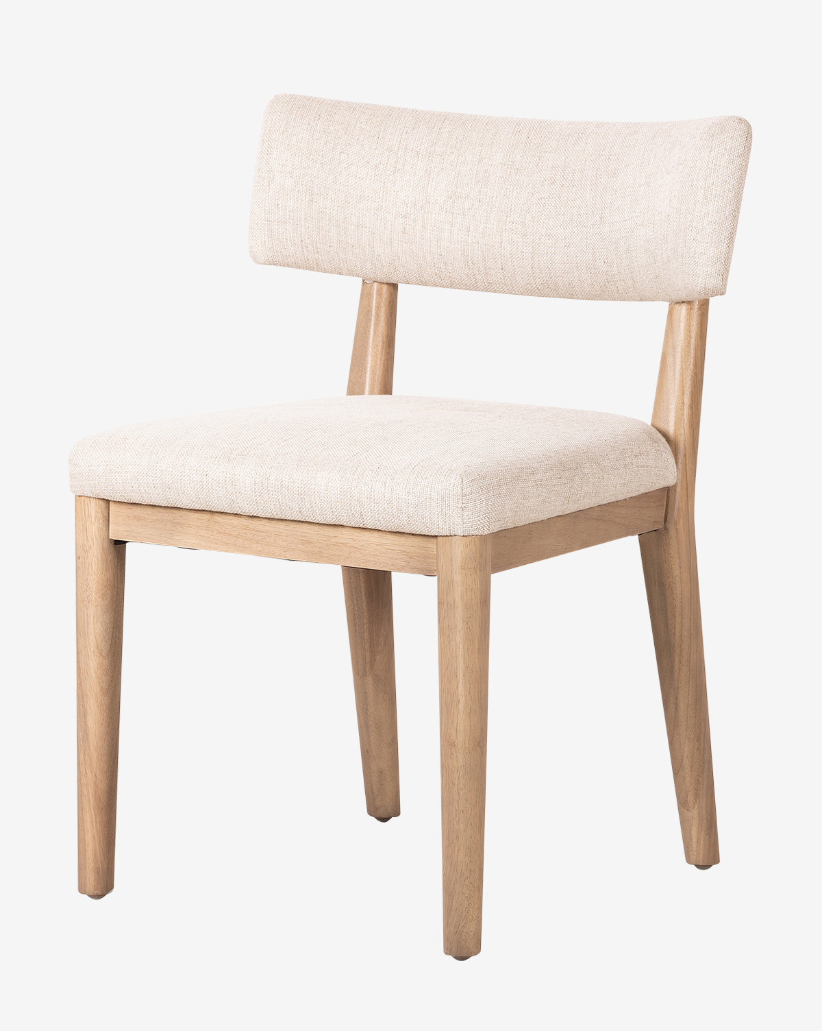 The Swift Dining Chair is shown on a plain white background, featuring a modern design with a light beige upholstered seat and backrest, and four straight legs by McGee & Co.