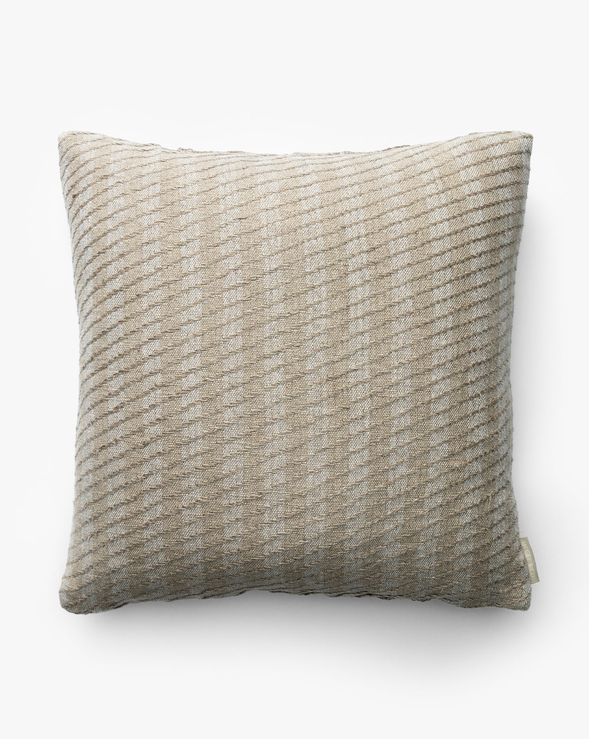 The Syracuse Pillow Cover is a square, beige decorative pillow cover with a ribbed, subtly striped linen texture, shown against a plain white background by McGee & Co.