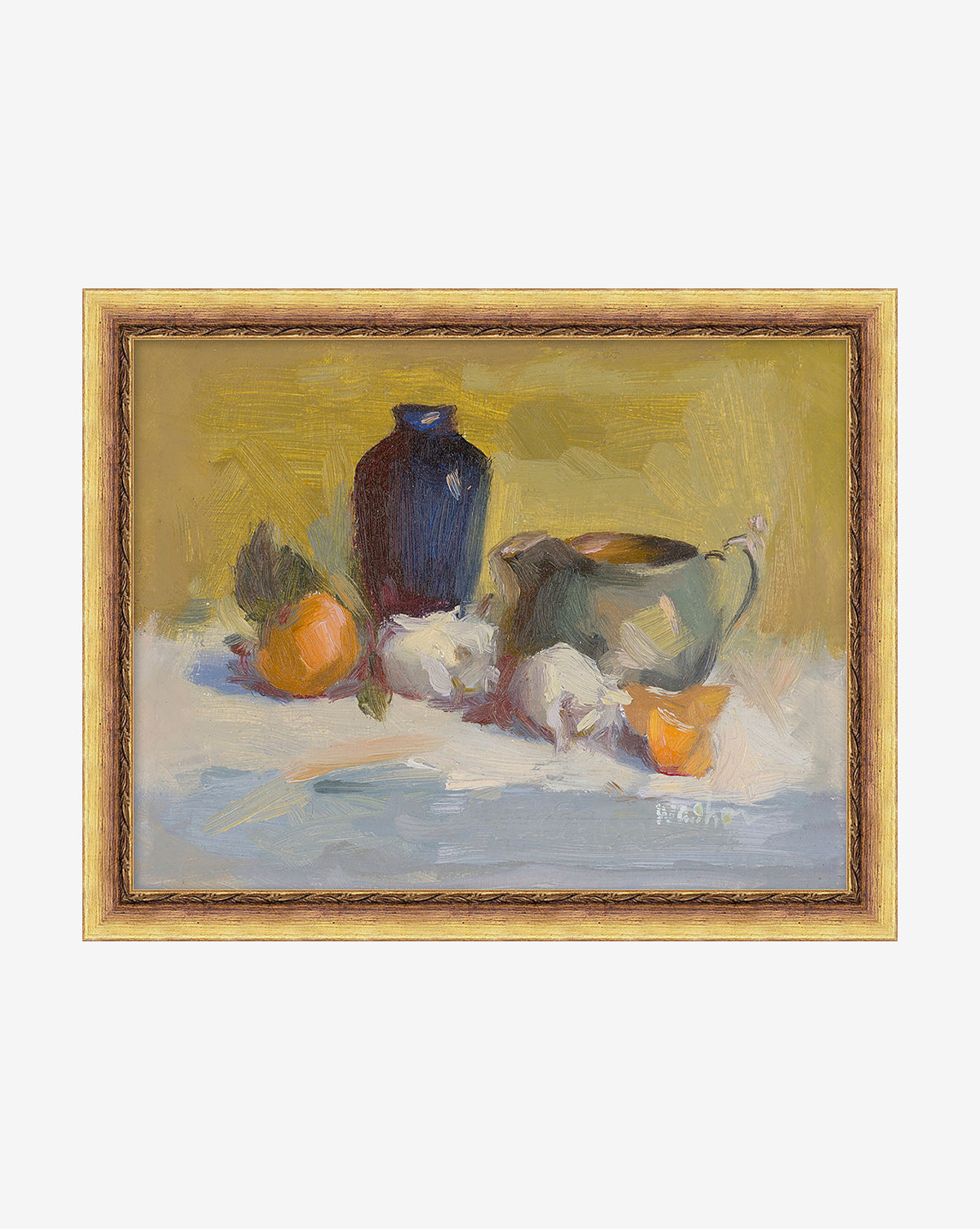 “Table Top Still Life” by Joyce Washor is a framed painting depicting a blue vase, green jug, orange, garlic bulbs, and lemon wedge arranged on a tablecloth against a bright yellow backdrop.