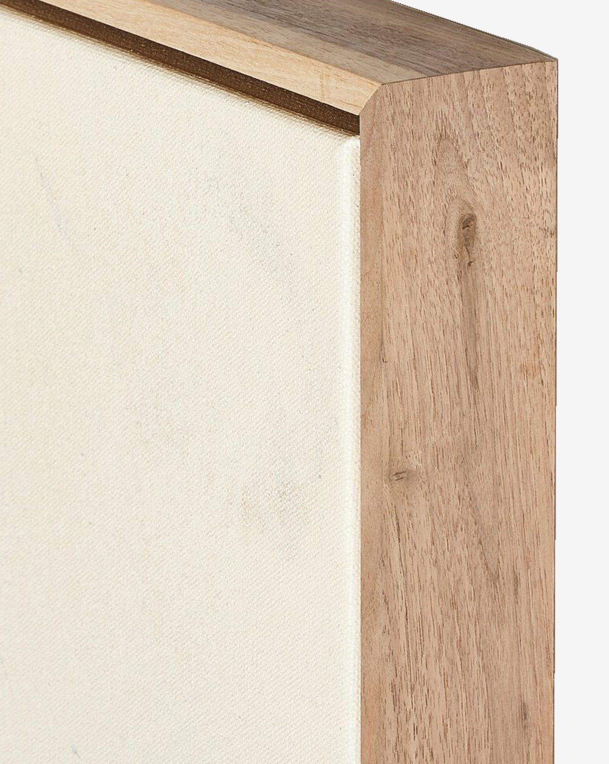 Close-up of the corner of a rustic walnut frame encasing Tender Provisions by Tyler Guinn, showcasing its white matte canvas and sharp edges that emphasize the natural wood grain and texture, by McGee & Co.
