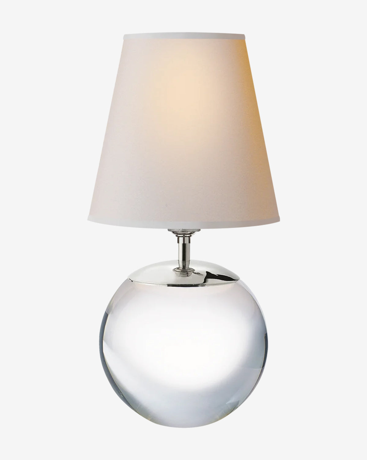 The Terri Round Table Lamp boasts a sleek, reflective silver base and a white fabric shade, offering soft ambient light—an ideal touch of elegance for any modern space, by McGee & Co.