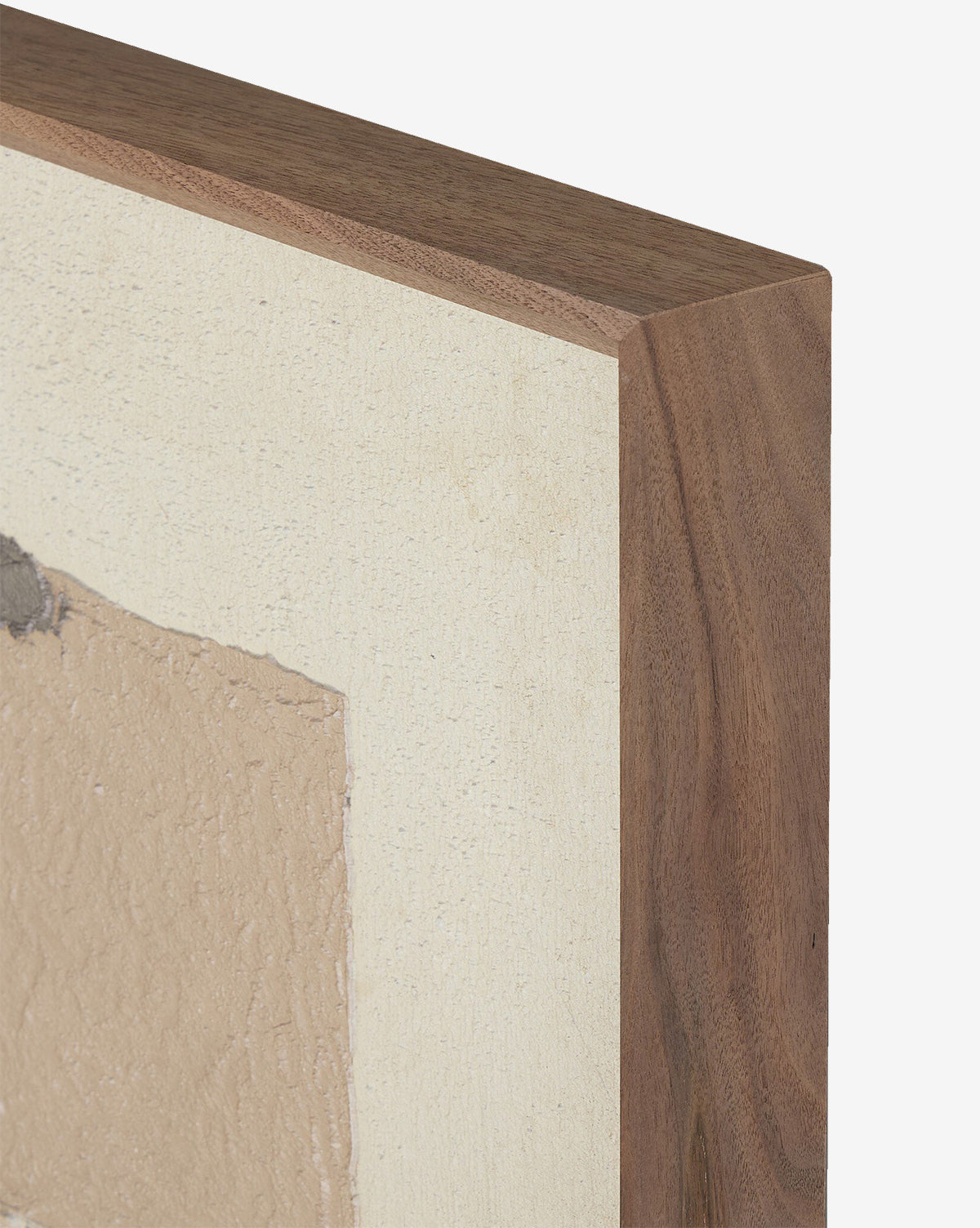 Close-up of the corner of The Beauty Of Broken Vessels No. 1 by Tyler Guinn, an abstract wall art piece with a textured beige and off-white design, set in a smooth natural wood frame, by McGee & Co.