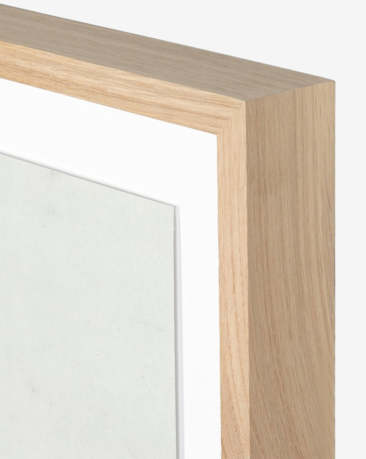 Close-up of a white oak frame with a white mat, featuring The Old Town by Dan Hobday. The smooth, natural finish is perfect for highlighting dimensional wall art or serene scenes like the artwork displayed.