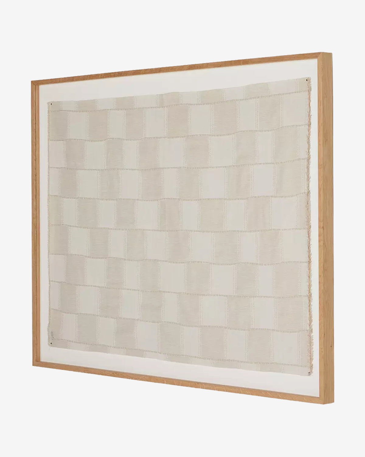 The Thomwell Woven Textile features a grid of light beige and off-white rectangles stitched together and framed in simple white oak, creating a refined textural art piece displayed against a white background.