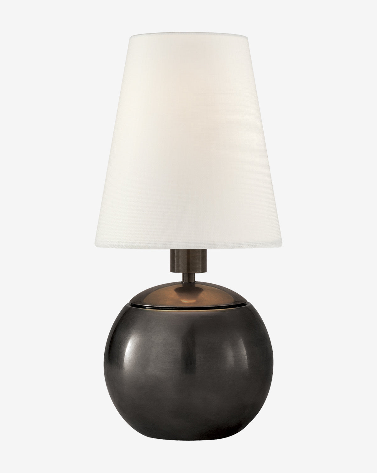 The Tiny Terri Accent Lamp has a round dark metallic base and a white cone-shaped fabric shade, shown on a plain white background by McGee & Co.