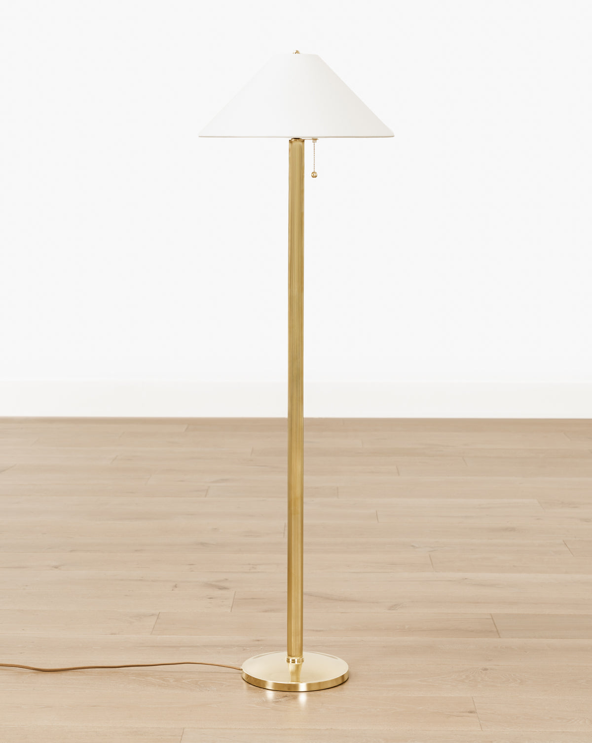 McGee & Co. brass floor lamp with linen shade.