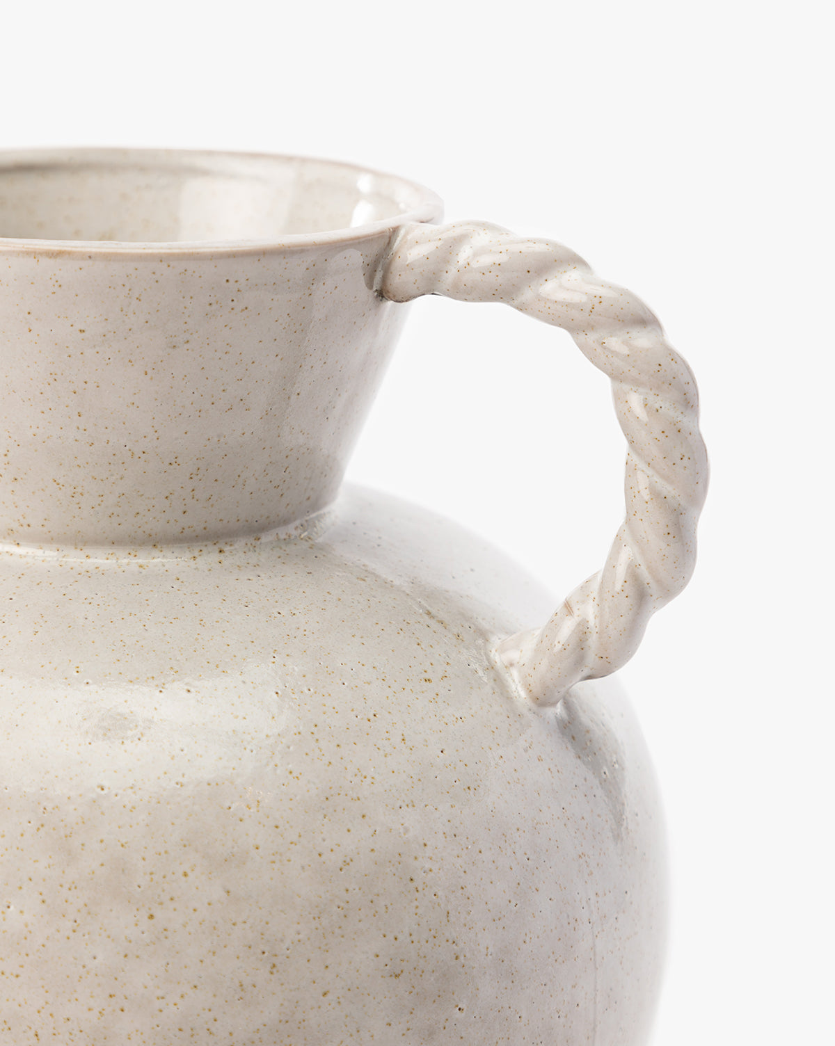 Close-up of the Tyrion Vase, a light beige ceramic piece with a twisted handle and speckled, slightly glossy finish—ideal for adding rustic charm to your decor against a plain white background.