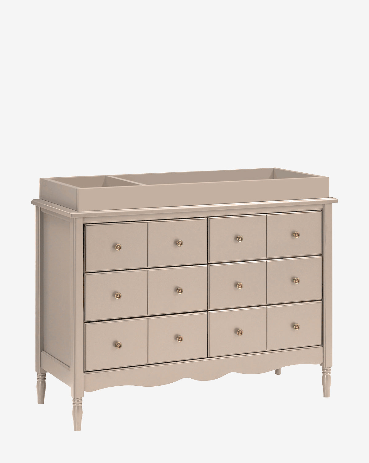 The Universal Wide Removable Changing Tray is a beige wooden dresser with 12 drawers, round gold knobs, curved base details, four turned legs, and an attached removable tray—ideal for organizing baby essentials, by McGee & Co.