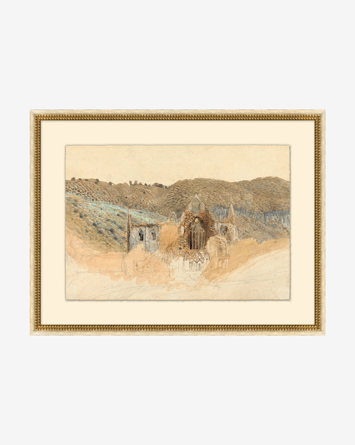 Unveiling Foundations: A framed sketch of a historic stone ruin amid rolling hills, rendered in brown and blue on watercolor paper. The elegant gold-finished wood frame with a decorative edge completes this timeless piece, by McGee & Co.