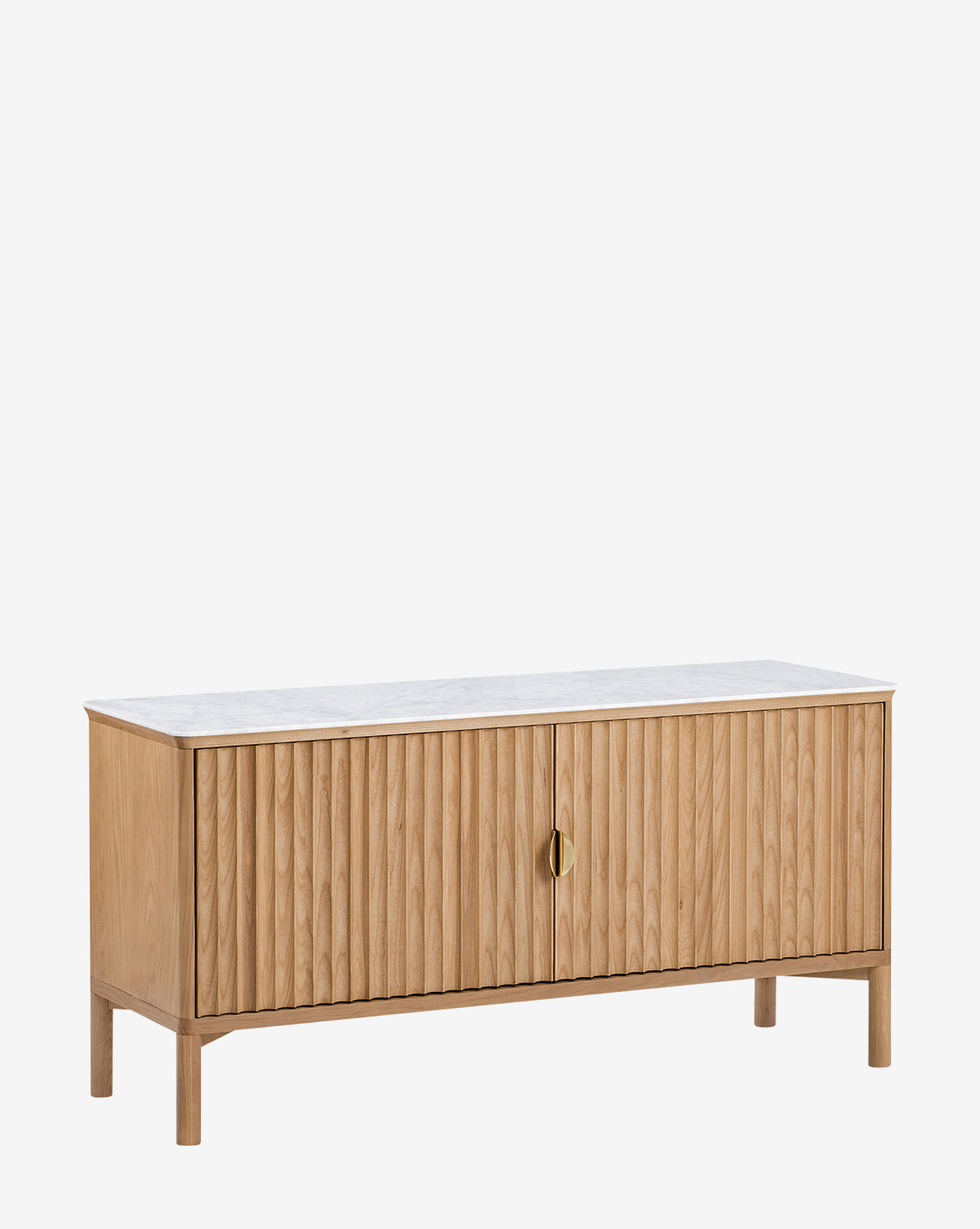 The Vale Sideboard features vertical-grooved oak doors, a white marble top, four legs, and a single round antique brass handle on the front, by McGee & Co.