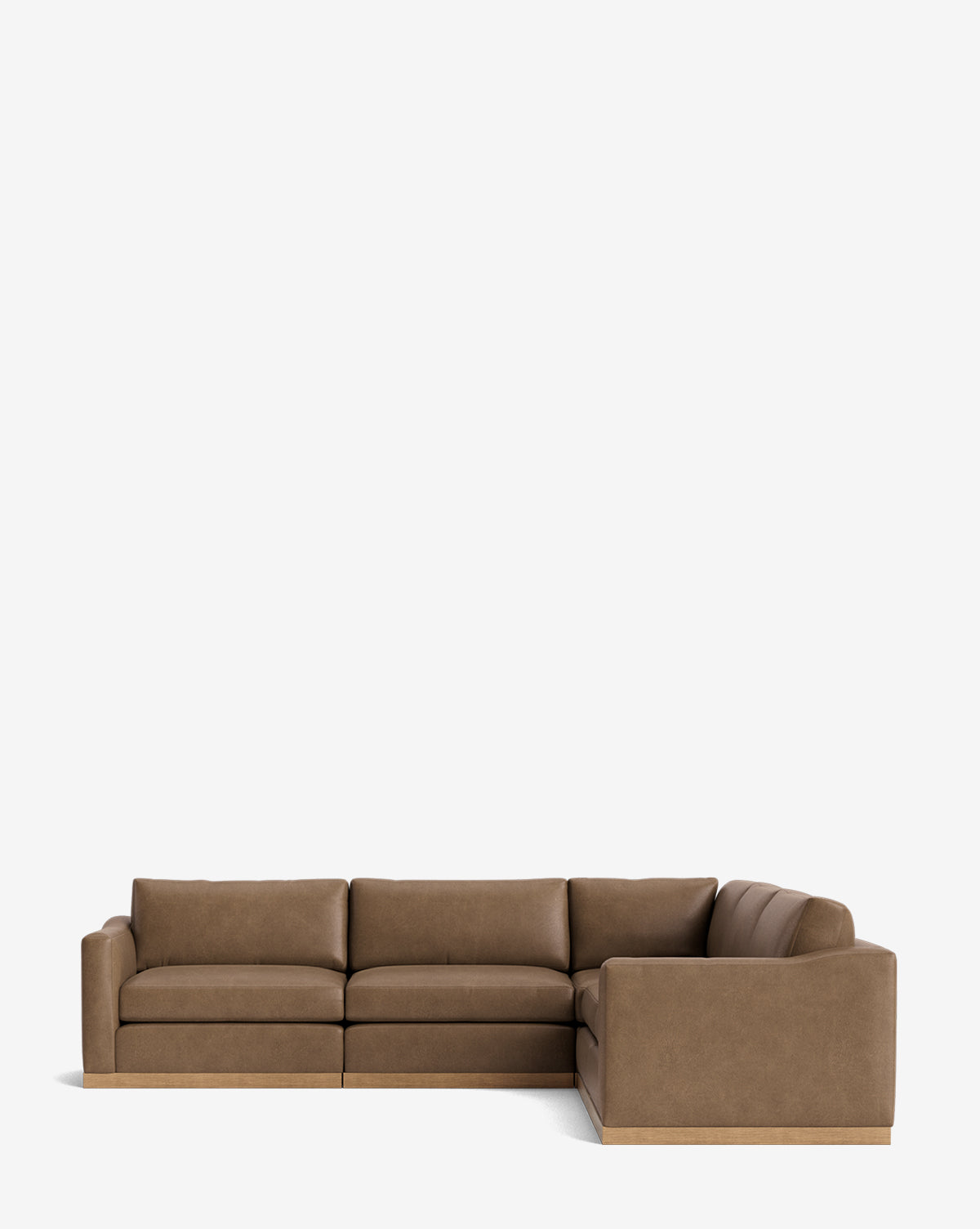 The Vernon Modular L Sectional 117.5 features plush brown velvet cushions and a low wooden base, shown against a plain white background by McGee & Co.