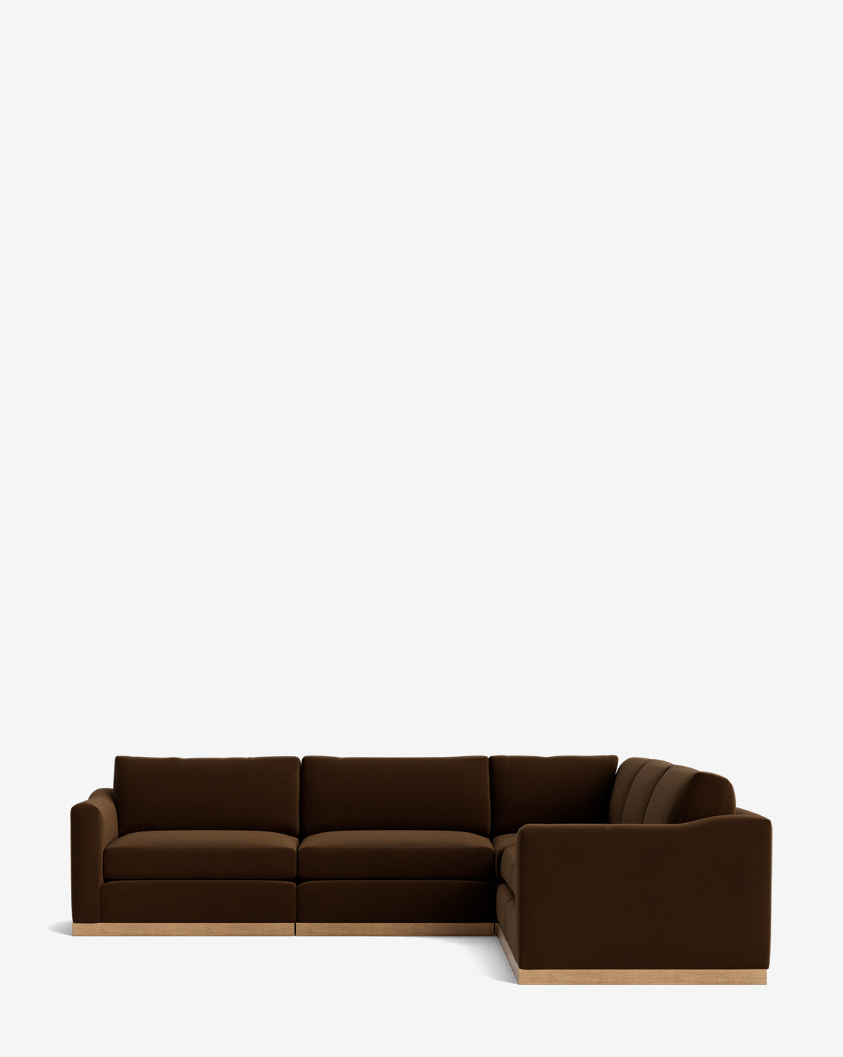 The Vernon Modular L Sectional 117.5 features a modern dark brown design with plush cushions and a low wooden base, offering customizable style and flexibility, shown against a plain white background by McGee & Co.
