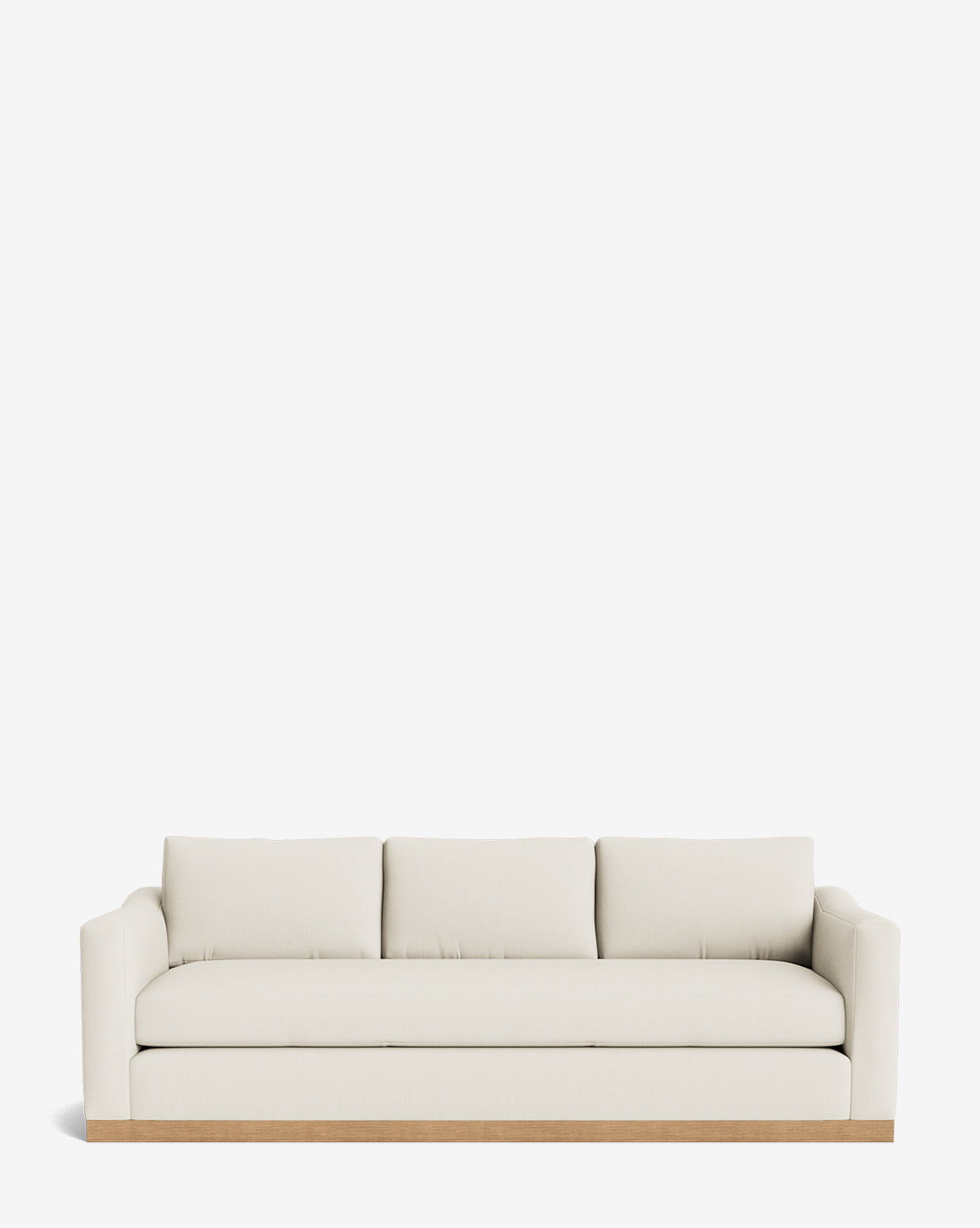 The Vernon Sofa 92 features cream velvet upholstery, boxy arms, three back cushions, and an alder wood frame base, showcased against a plain white background by McGee & Co.