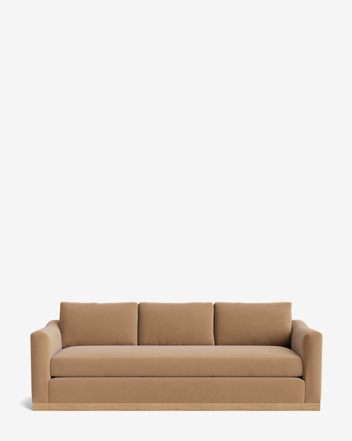 The Vernon Sofa 92 is a modern tan velvet sofa with three seat and back cushions, wide armrests, and an alder wood frame, shown against a plain white background by McGee & Co.