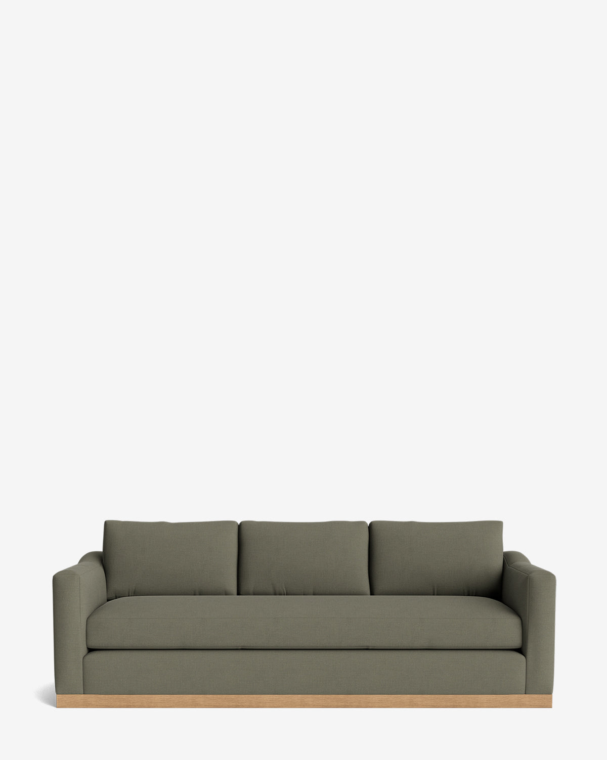 The Vernon Sofa 92 is a modern olive green velvet three-seater with straight arms, three back cushions, and an elegant alder wood frame, shown against a plain white background by McGee & Co.