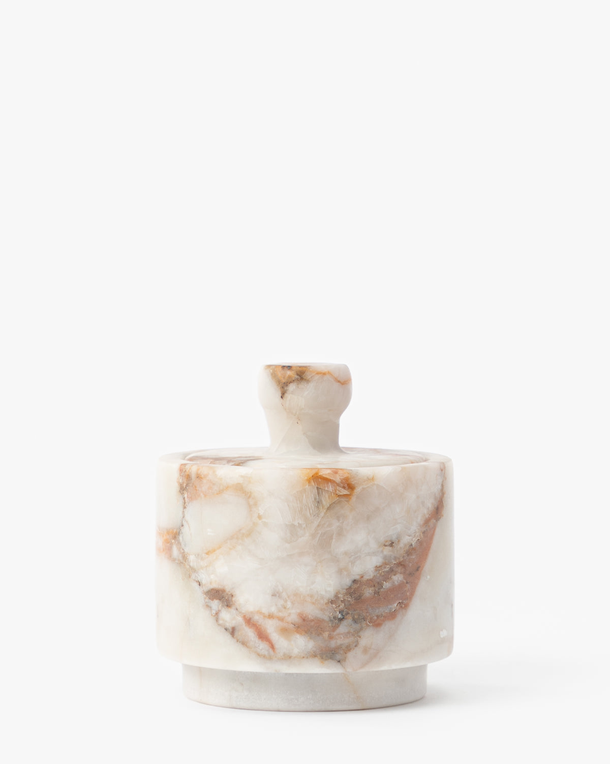 The Verona Matte Marble Lidded Jar features a round, white marble design with brown and tan veining, a matching lid with a small knob—ideal as decorative marble jar or kitchen countertop decor, by McGee & Co.