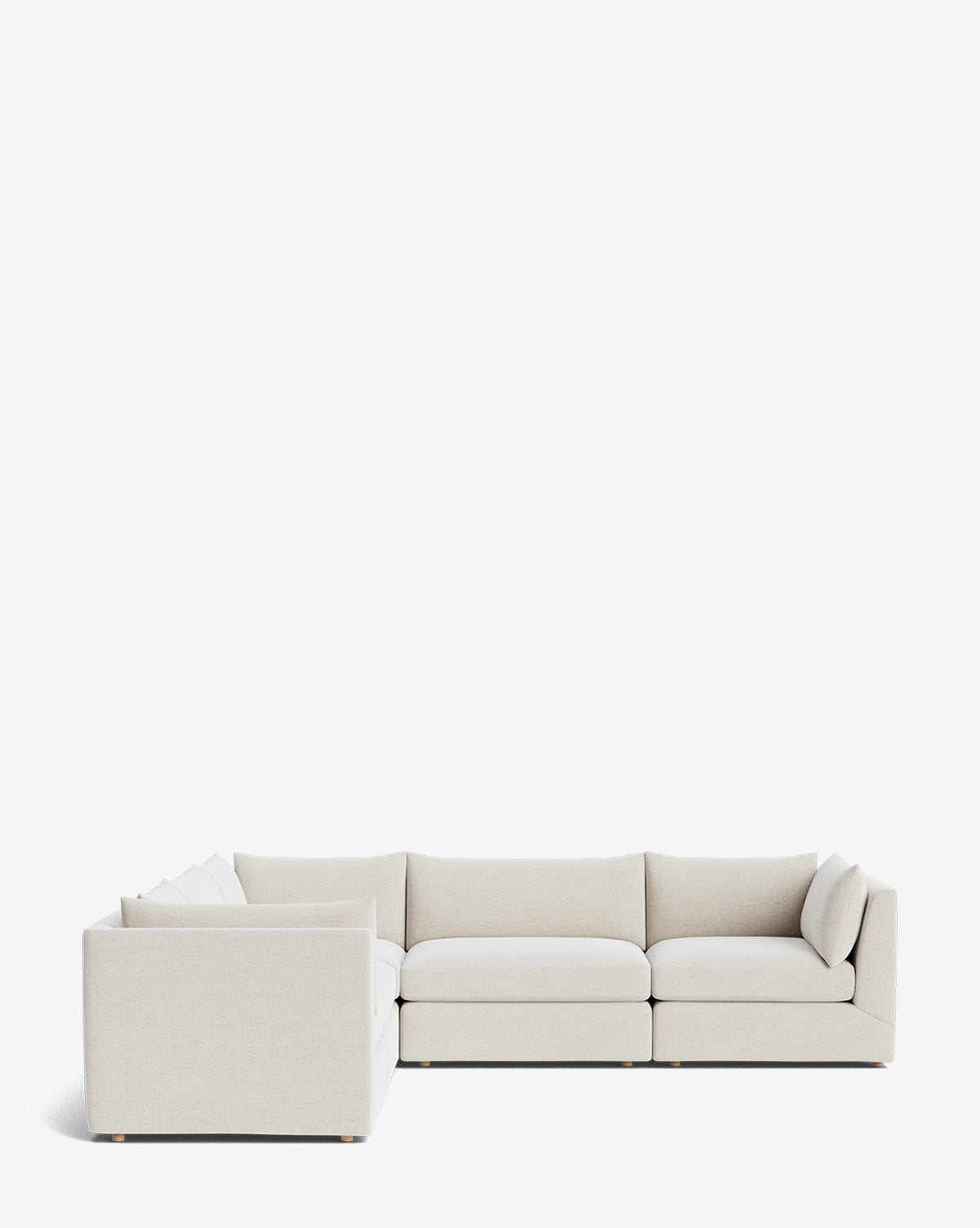 The Makerspalm Vivienne Modular L Sectional features a modern, low-profile design with plush cushions and light beige upholstery, shown against a plain white background. McGee & Co.