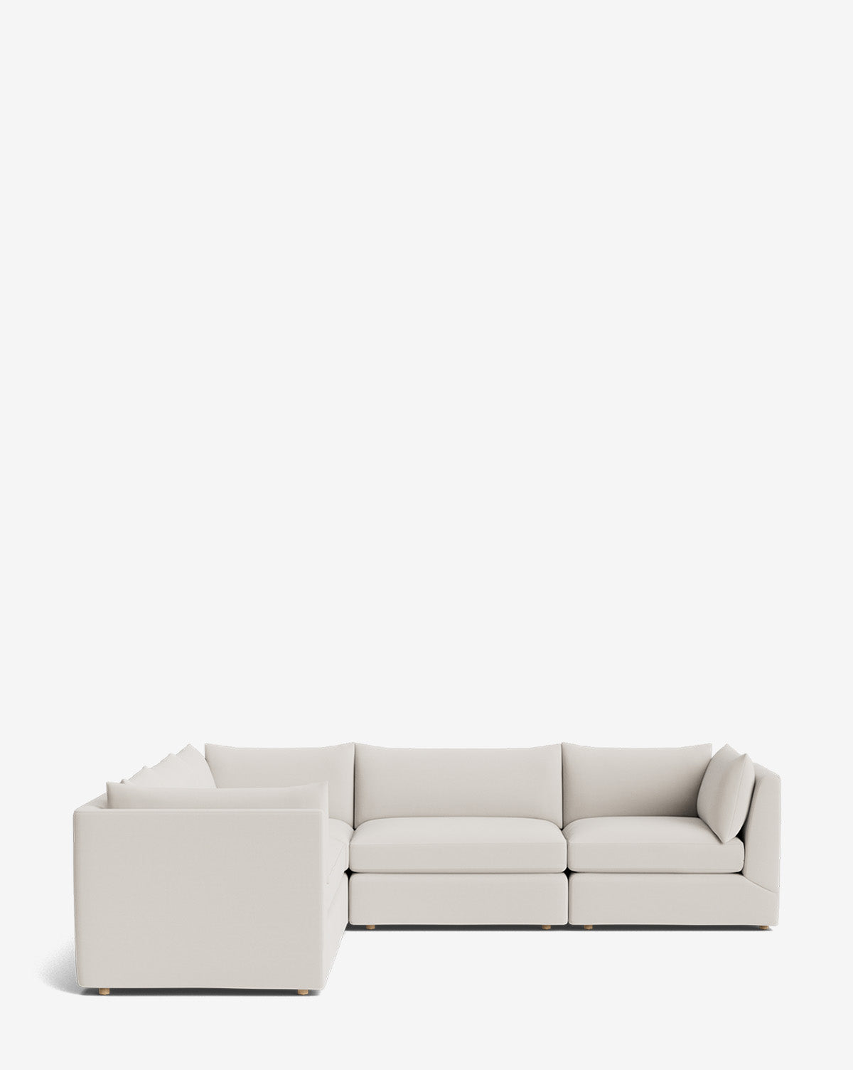 The Makerspalm Vivienne Modular L Sectional is a modern light beige sofa featuring clean lines and low-profile backrests, showcased against a plain white background. McGee & Co.