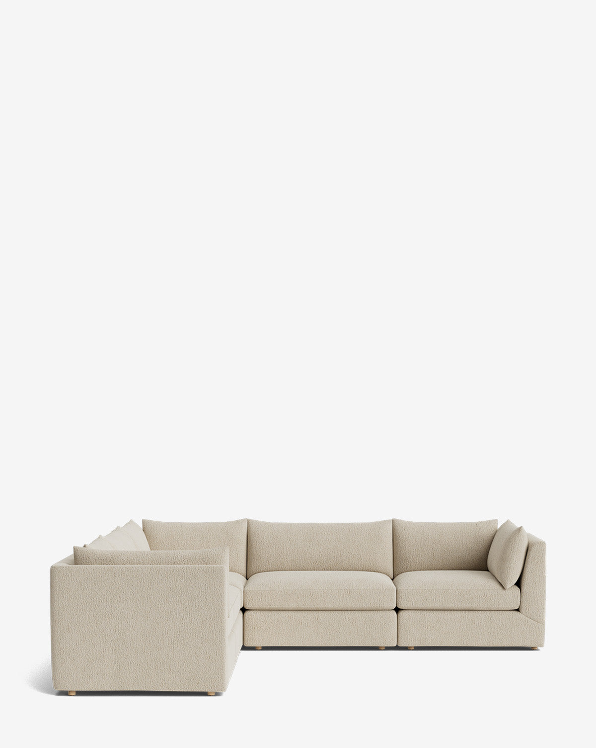 The Makerspalm Vivienne Modular L Sectional is a beige, modern sofa with low-profile back and seat cushions, minimalist design, and wooden feet, shown against a plain white background. McGee & Co.