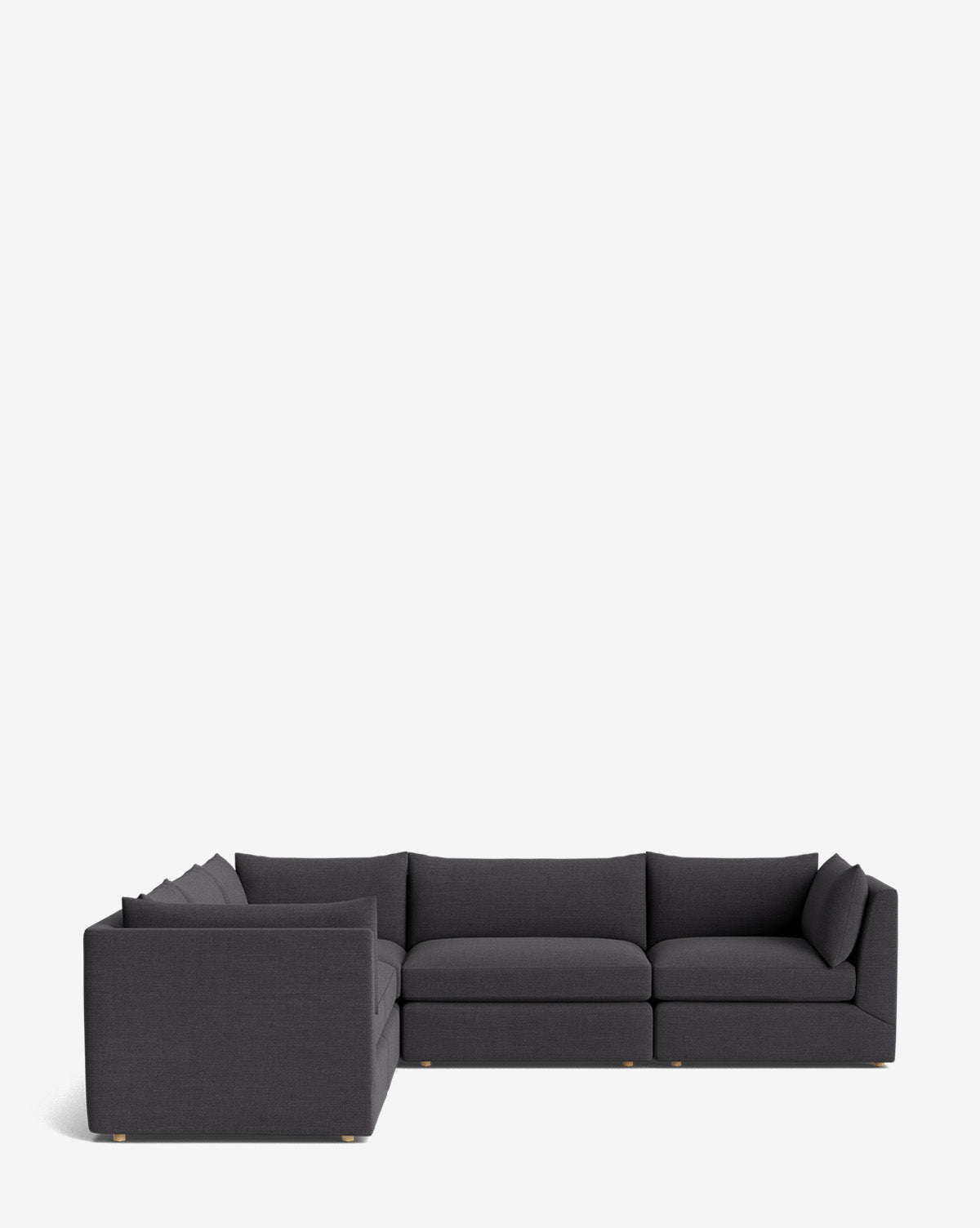 The Makerspalm Vivienne Modular L Sectional features a dark gray color with low-profile, cushioned seats and backrests, displayed against a plain white background. McGee & Co.